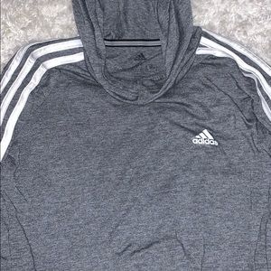 Adidas small long sleeve shirt never been worn.